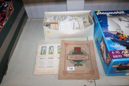 A quantity of various cigarette cards