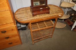 A wicker side table AF