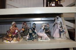 A quantity of various figurines to include Lladro; Nao; Capodimonte style etc.