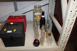 A quantity of various glass bottles and jars