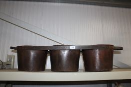 Three connected planters (151)