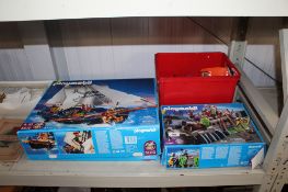 Two boxed Playmobile sets 5810 and 5863 together with a box containing various Playmobil and other