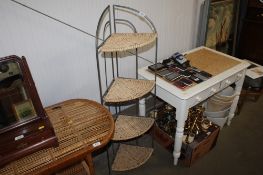 A metal framed corner four tier shelving unit with wicker shelves