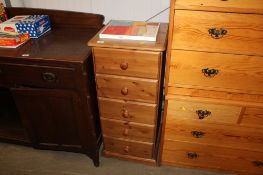A pine chest fitted fiver drawers of narrow proportions