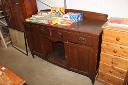 An oak sideboard fitted two drawers