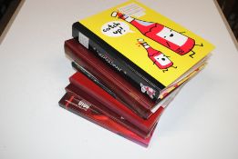 A box containing Royal Mail stamp books and world stamps