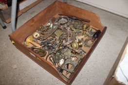A wooden drawer and contents of various door furniture etc.