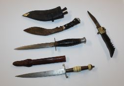 A box containing four various knives including vintage lock knife with corkscrew. This item can only