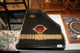 A Menzenhauers American guitar zither