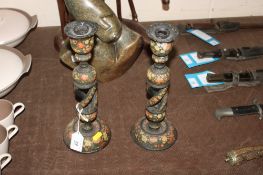 A pair of open twist and Kashmiri decorated candlesticks