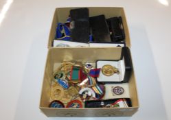 Two boxes containing a large quantity of Masonic regalia, medals and a pocket watch