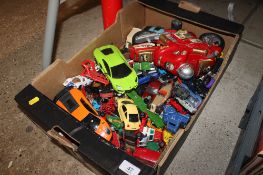 A box containing various die-cast vehicles mostly play worn