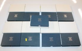 Nine Royal Mint United Kingdom proof coin collections