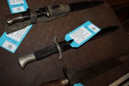 A Third Reich era fireman's dress bayonet by Gustav Spitzer Solingen, with original black painted