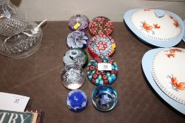 A collection of paperweights