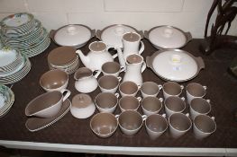A Poole twin tone part dinner, tea and coffee service
