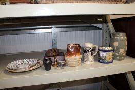 A Royal Doulton Lambeth stoneware pitcher No.131 together with a Harvest Ware style jug; a pottery