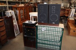 An NEC stereo cabinet containing a Technics stack comprising a stereo integrated amplifier, cassette
