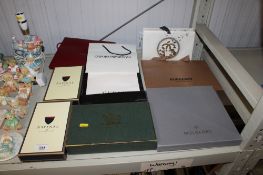 A quantity of various empty boxes and bags to include Aspinall of London, Gucci, Chanel, Burberry,