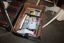 A box containing various cassettes etc.