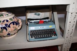A Lettera 32 portable typewriter and case
