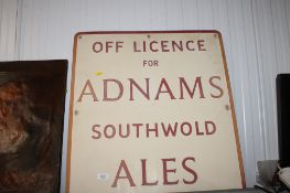 A metal Adnam's Ales advertising sign