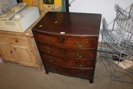 A mahogany bedroom chest fitted four drawers