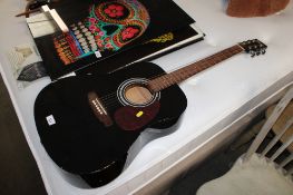 An Encore acoustic guitar