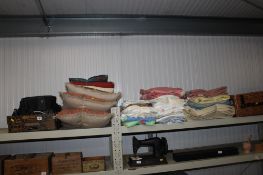 A quantity of various cushions; handbags; fabric etc.