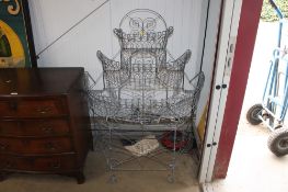 A wire work three tier demi lune planter