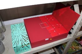 A Fortnum & Mason box and a Look Fantastic advent calendar lacking contents