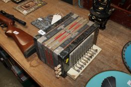 An Antoria accordion with mother of pearl buttons