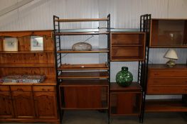 A two section Staples Ladderax unit to include two cabinets with wooden sliding doors, a shelving