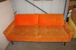 A modern design orange upholstered settee