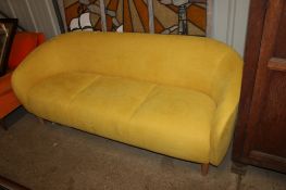 A John Lewis yellow upholstered three seater settee