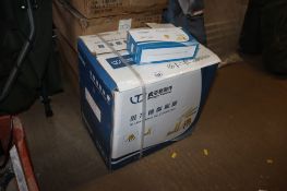 A box containing a quantity of wall plugs and screws