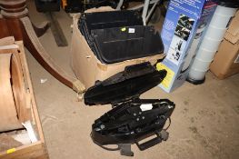 A box containing a quantity of plastic troughs and a car jack in plastic case