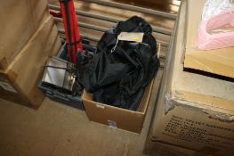 A box containing a quantity of Land Rover Freelander seat covers