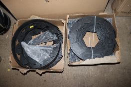 Two boxes containing a quantity of plastic lawn edging