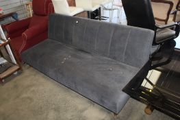 A John Lewis blue upholstered sofa bed