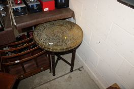 An Eastern brass tray table