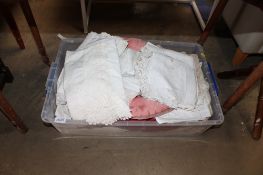 A tray of lace and other table napery