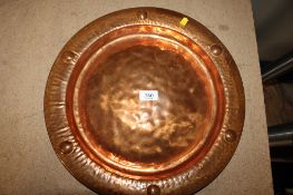 An Arts & Crafts design beaten copper tray