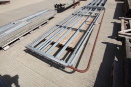 + VAT 2x 12ft galvanised cattle yard gates. One with top rail.