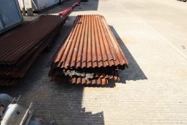 Pallet of corrugated tin.