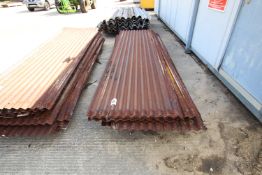 Pallet of corrugated tin.