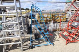 Small set of wheeled platform steps.