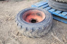 + VAT 10-16.5 Bobcat spare wheel and tyre.
