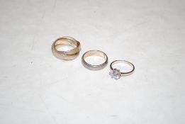 A Tiffany & Co. 925 silver ring; a 925 silver triple ring; and a 925 silver ring set with