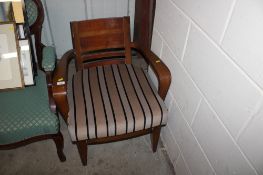A Grange upholstered tub chair